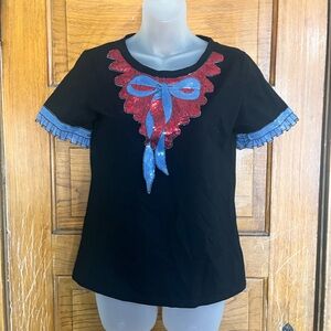 Black Short Sleeve Top with Red and Blue Accents